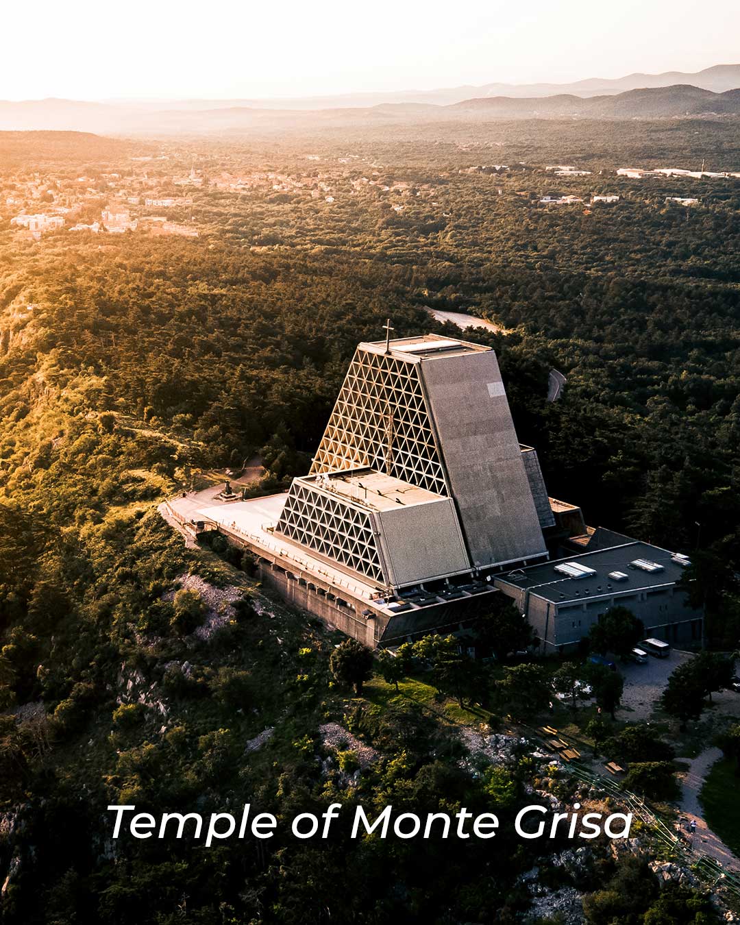 Temple of Monte Grisa overlooking the forest near Trieste at sunset