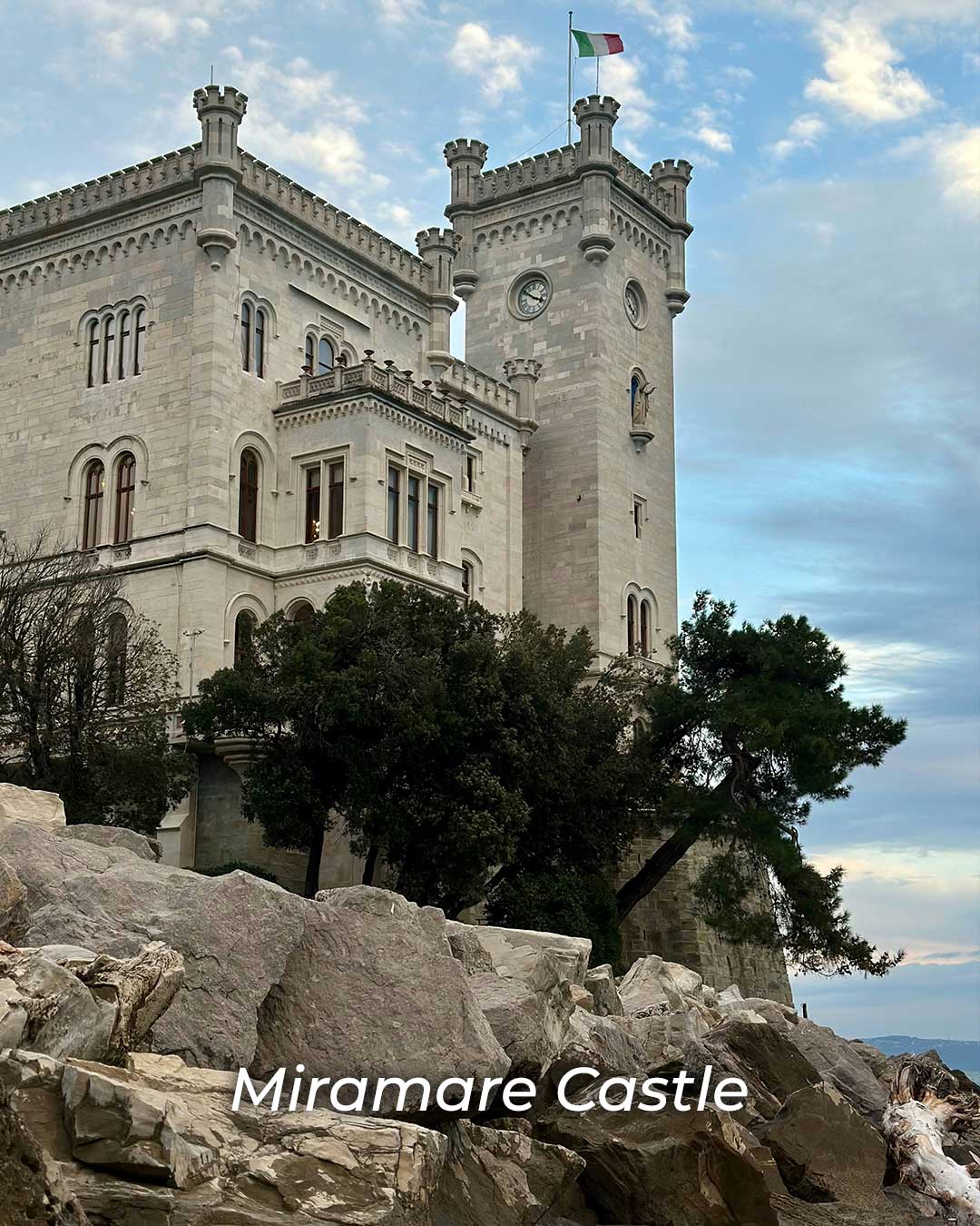 Seaside view of Miramare Castle near Trieste, perched on a cliff above the Adriatic Sea